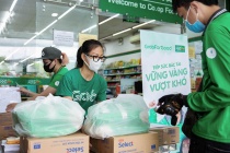 Grab tặng gần 80 tấn gạo hỗ trợ tài xế vượt dịch Covid-19