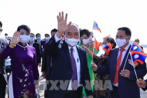 Chủ tịch nước Nguyễn Xuân Phúc tới Thủ đô Viêng Chăn, bắt đầu thăm hữu nghị chính thức Lào