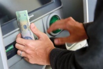 Quảng Nam thí điểm chi trả chính sách an sinh xã hội không dùng tiền mặt