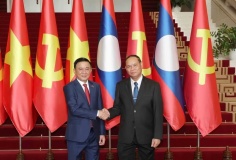 Thường trực Ban Bí thư Trần Cẩm Tú hội đàm với Thường trực Ban Bí thư Trung ương Đảng Nhân dân Cách mạng Lào