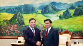 Phó Thủ tướng Thường trực Phạm Gia Túc chào xã giao Tổng Bí thư, Chủ tịch nước và Thủ tướng Lào