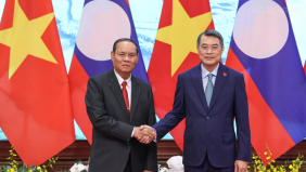 Lào quyết tâm cùng Việt Nam gìn giữ, vun đắp và phát huy mối quan hệ hữu nghị vĩ đại