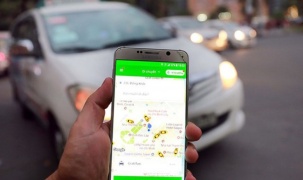 Doanh nghiệp taxi truyền thống 'tố' Grab hoạt động trái phép