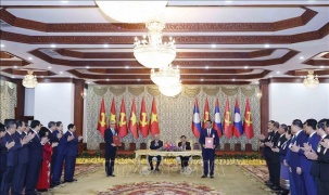 Tổng Bí thư Tô Lâm chứng kiến Lễ trao các văn kiện hợp tác Việt Nam - Lào