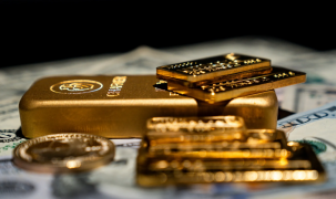 Vàng sụt giá do USD mạnh lên, SPDR Gold Trust mua thêm gần 8 tấn