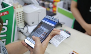 Thúc đẩy thanh toán không dùng tiền mặt nhằm hiệu quả quản lý thuế