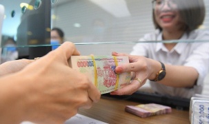 Tiền gửi tăng nhanh hơn tín dụng, thanh khoản ngân hàng bớt căng