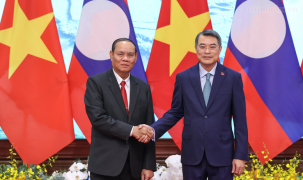 Lào quyết tâm cùng Việt Nam gìn giữ, vun đắp và phát huy mối quan hệ hữu nghị vĩ đại